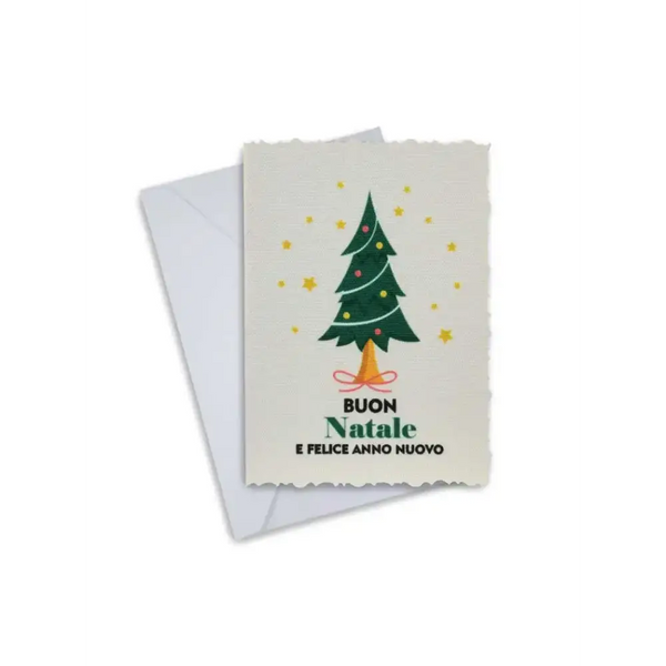 Elegant Christmas greeting card with festive tree design and envelope.