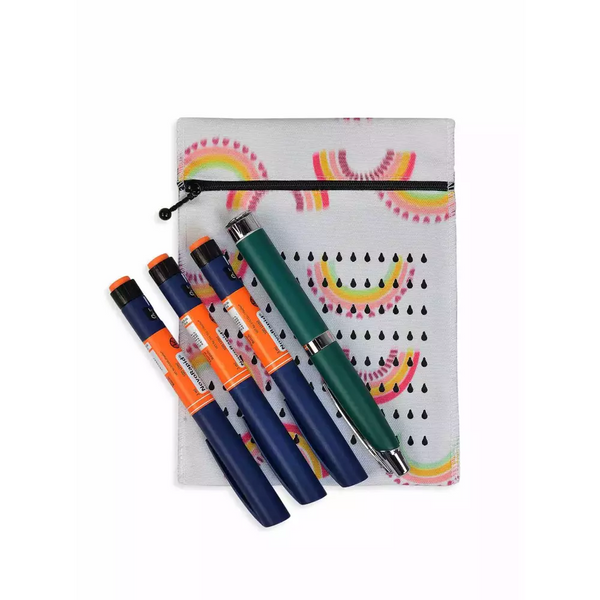 Insulin cooling wallet with colorful design holding four insulin pens.