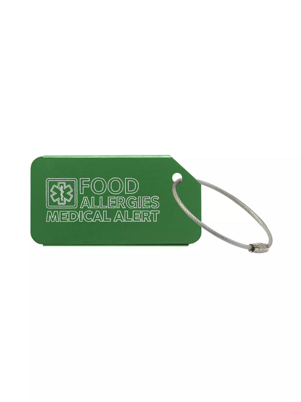 Green medical luggage tag with the text 'Food Allergies Medical Alert' engraved.