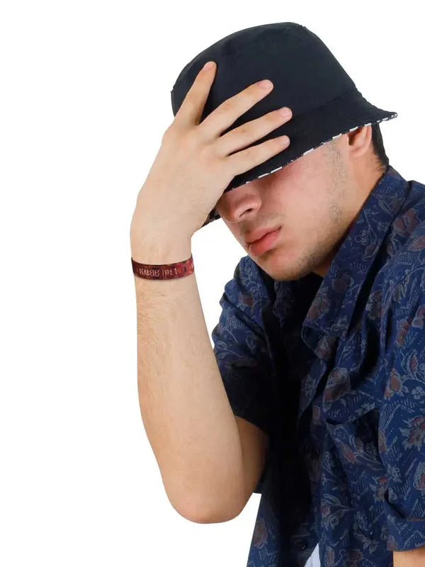 Reversible Diabetes Awareness Wristband worn on wrist, stylish and meaningful accessory.