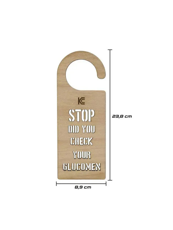 Door hanger for diabetics with "STOP! DID YOU CHECK YOUR GLUCOMEN" message in light plywood.