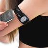 Person wearing a Dexcom G7 armband with a continuous glucose monitor attached, holding a smartphone displaying glucose level data, representing a wearable device for diabetes management.