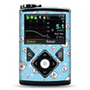 Medtronic Minimed insulin pump adorned with a blue vinyl sticker featuring cute, small animal faces and stars. The device screen displays glucose monitoring data.