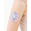 Spring-themed Freestyle Libre 2 patch on arm, secure and stylish adhesive for active lifestyles.