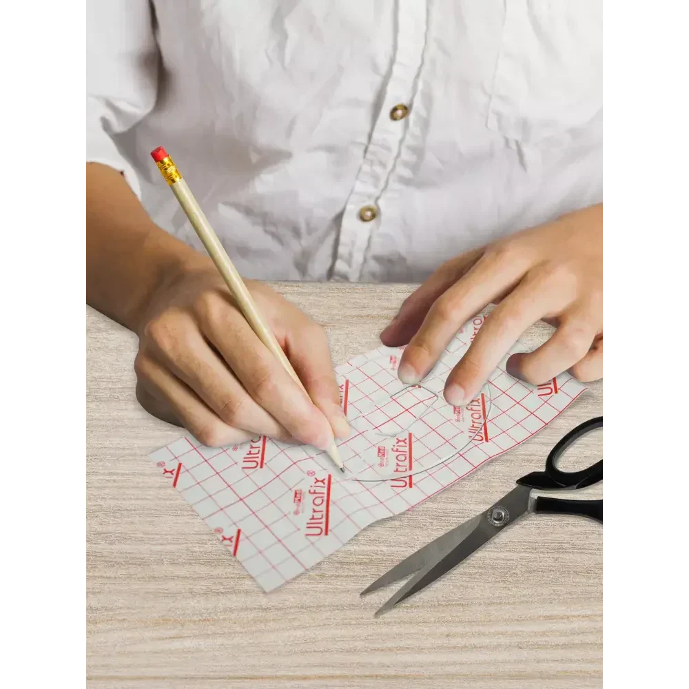 Crafting custom CGM sensor patches with Kaio-Patch Template, featuring acrylic template for precise cuts.