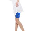 Blue lace garter securely holding an insulin pump on a woman's thigh under a white dress, designed for comfort and style.