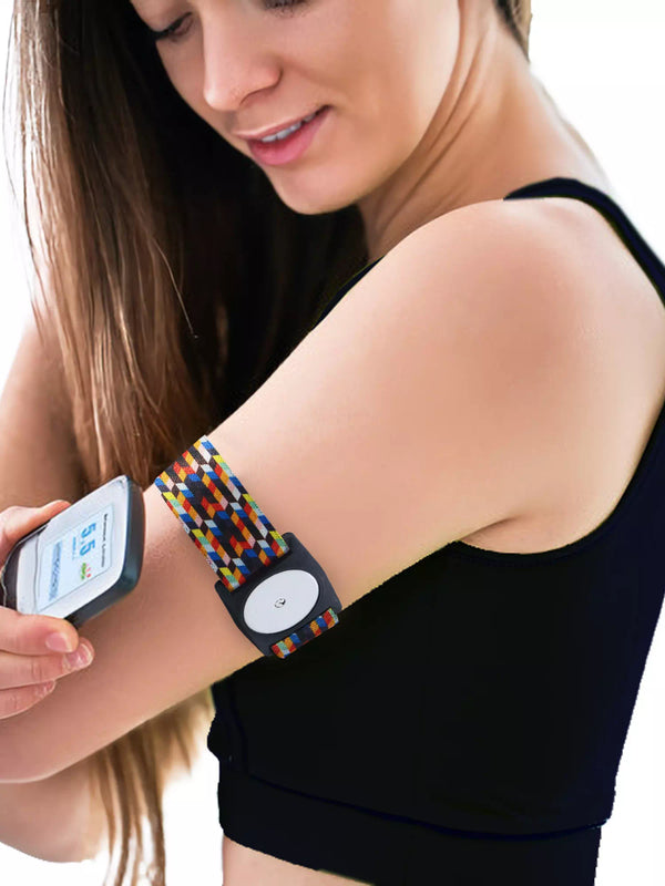 Colorful adjustable armband for Freestyle Libre 2, sporty design, secure fit on upper arm.