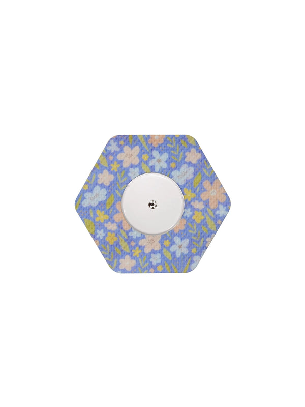 FreeStyle Libre 2 hexagonal shape patch in Meadow floral design, breathable adhesive overpatch to help support sensor wear