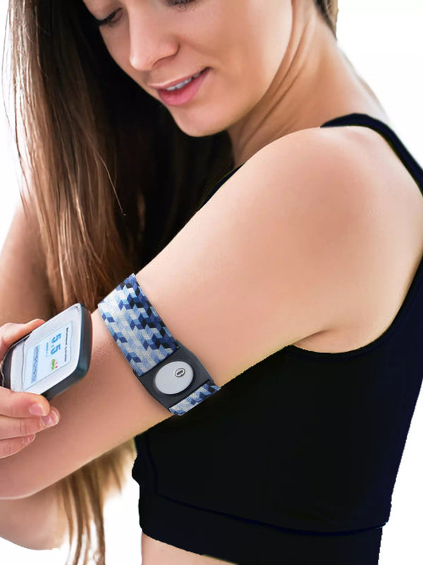 Freestyle Libre 3 Armband with graphic design on woman's arm for sensor protection.