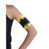 Glucose monitor and insulin pump armband in vibrant yellow and black, worn on upper arm for secure diabetes device management.