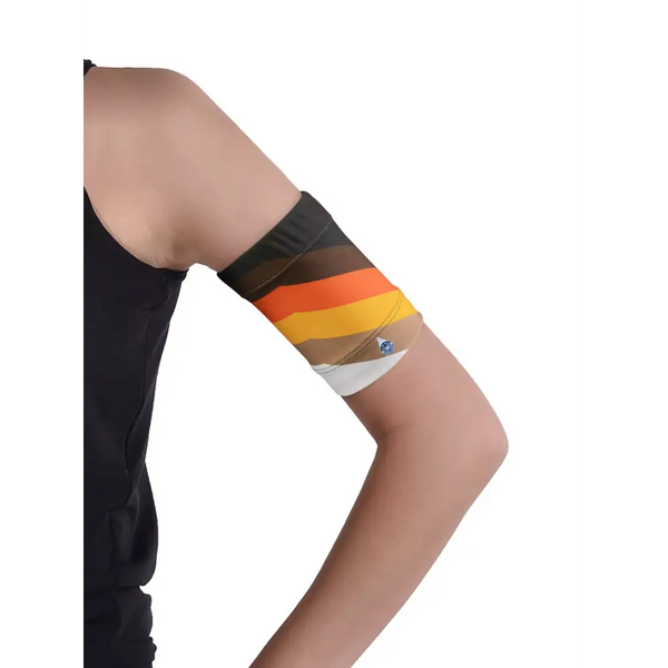 Glucose monitor and insulin pump armband with colorful striped design on arm for secure diabetes device placement.