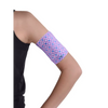Glucose monitor and insulin pump armband in pink geometric pattern, worn on upper arm for diabetes device protection and comfort.