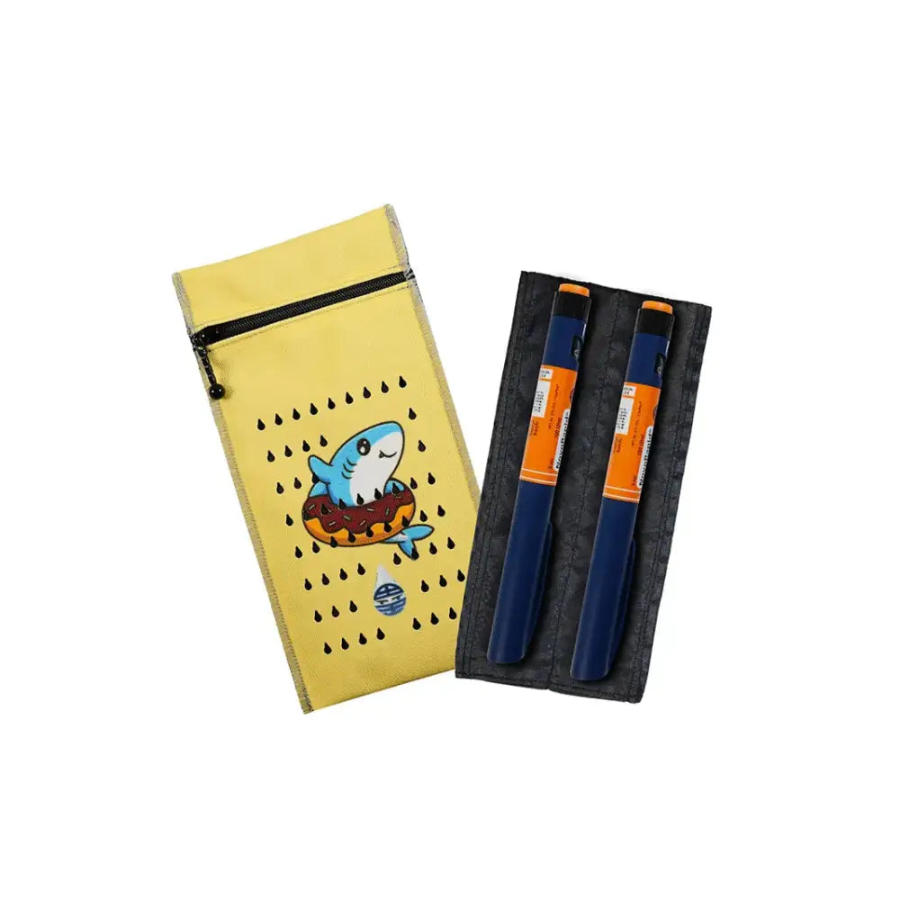Insulin cooling wallet for kids with shark design, fits 2 insulin pens or vials, maintains temperature for 48 hours.