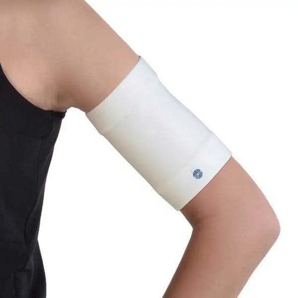 Protective armband for glucose sensor, Dia-Band in plain white color, designed for CGMs and insulin pumps, worn on the upper arm.