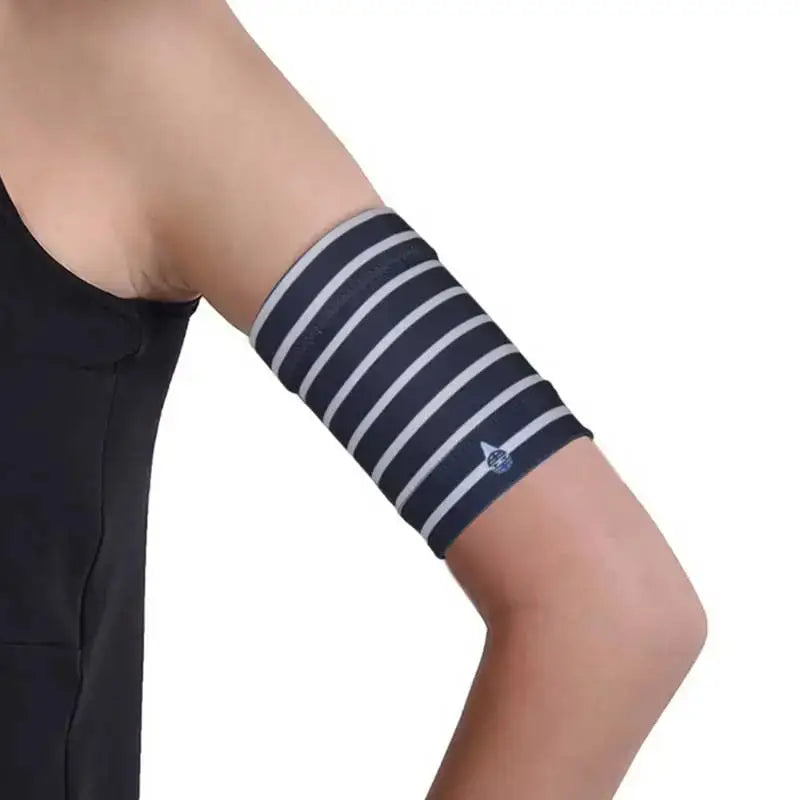 Striped CGM arm band for glucose sensor and insulin pump on upper arm.